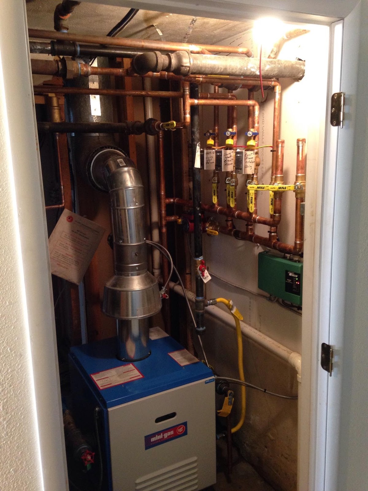 Boiler closet with neat copper piping